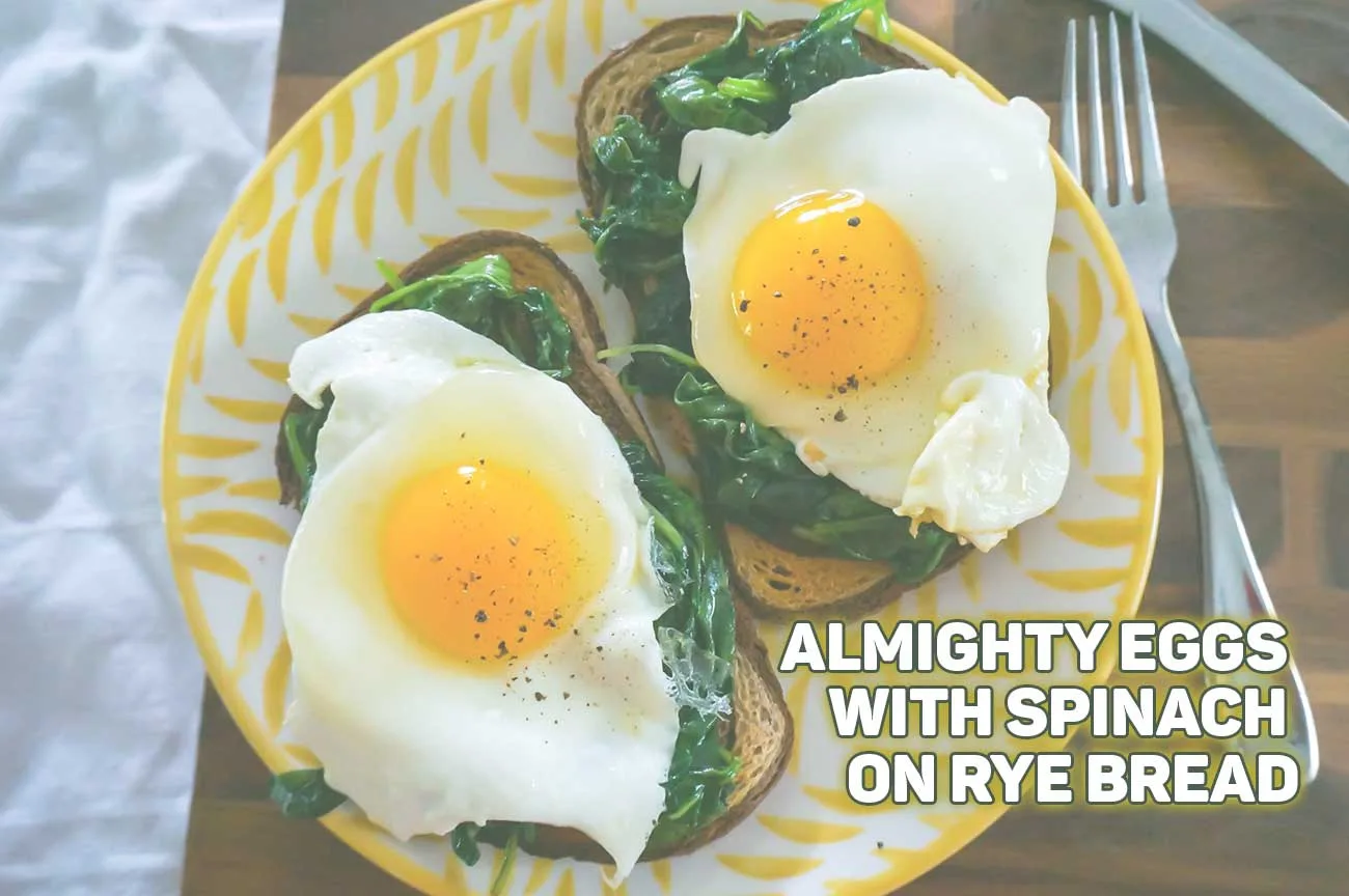 Almighty eggs with spinach on rye bread